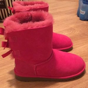 Pink lace up uggs never worn size 4